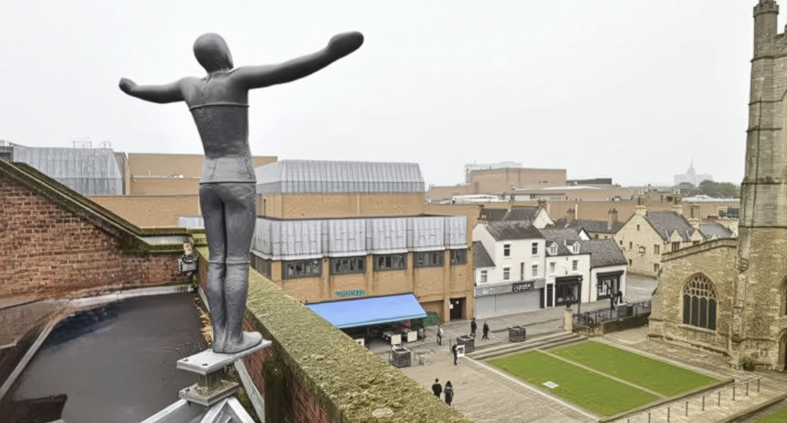 Antony Gormley sculpture overlooking Peterborough city centre